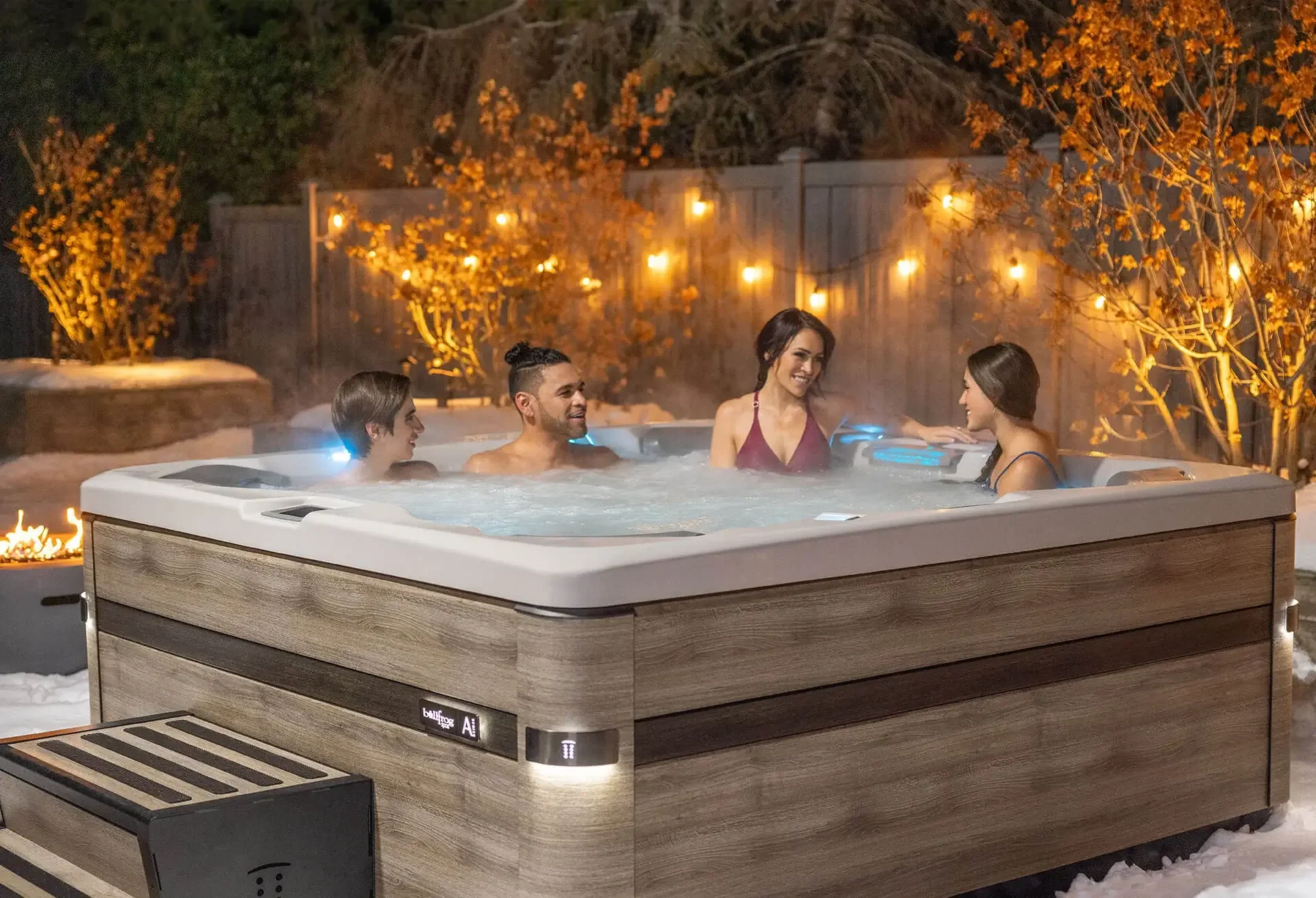 Bullfrog hot tub steaming on a winter evening